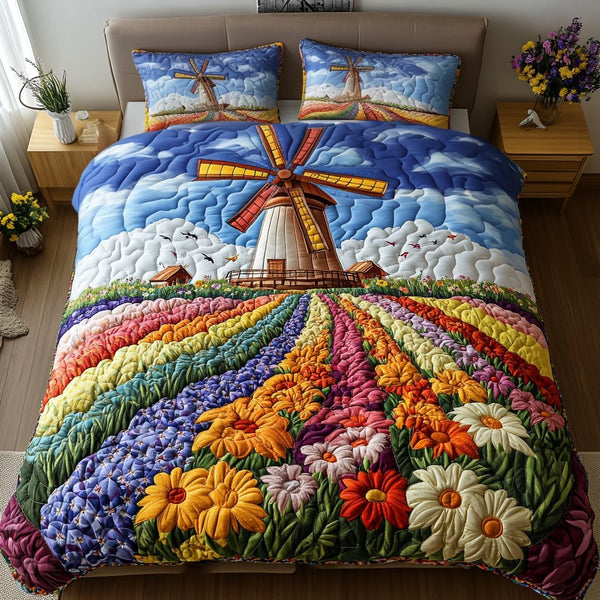 Windmill Meadow quilted 3-piece bedding set on a made bed with two matching pillow shams