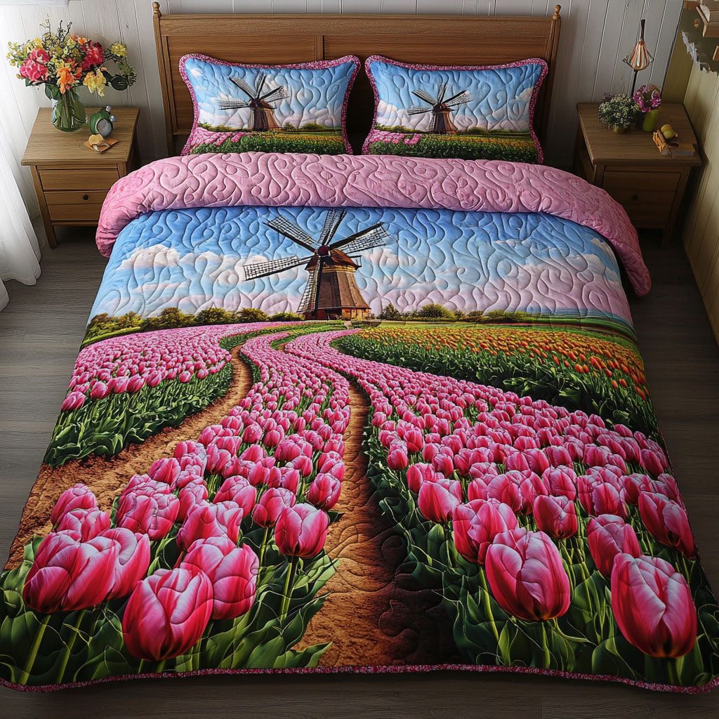 Windmill Petal Road quilted 3-piece bedding set on a made bed with two matching pillow shams
