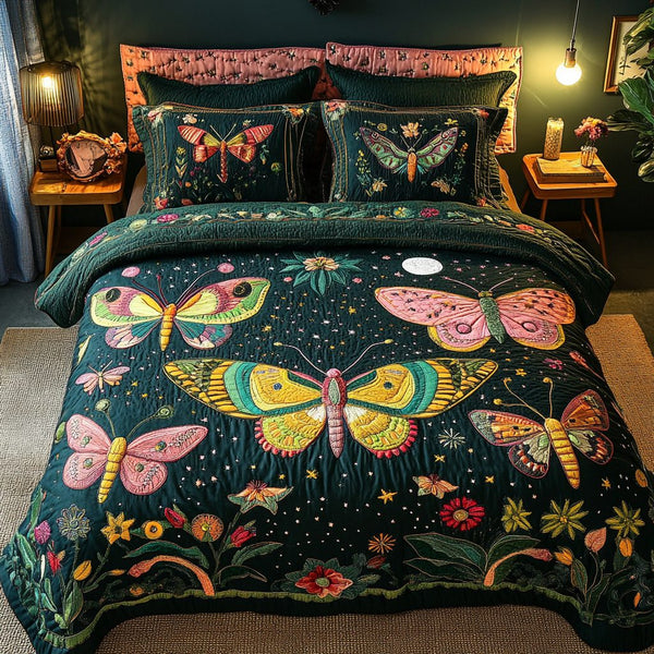 Wing Glow quilted 3-piece bedding set on a made bed with two matching pillow shams