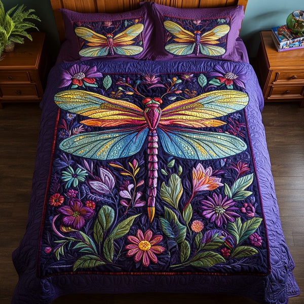 Winged Dreams quilted 3-piece bedding set on a made bed with two matching pillow shams