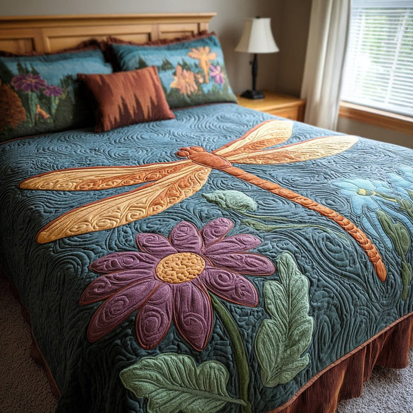 Winged Harmony quilted 3-piece bedding set on a made bed with two matching pillow shams