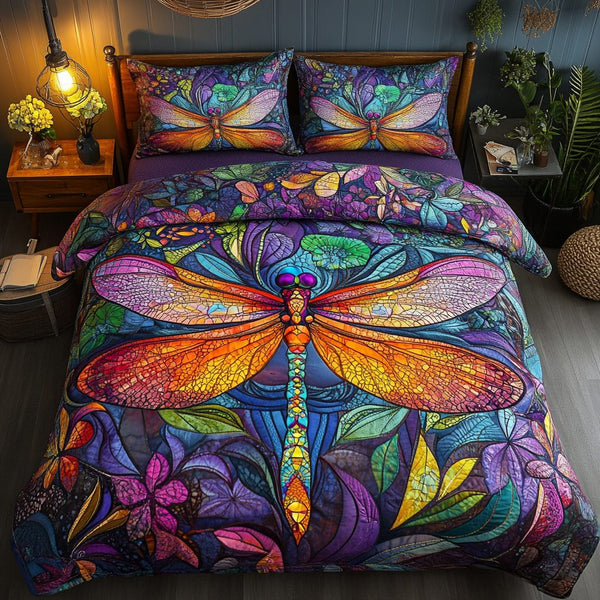 Winged Whimsy quilted 3-piece bedding set on a made bed with two matching pillow shams