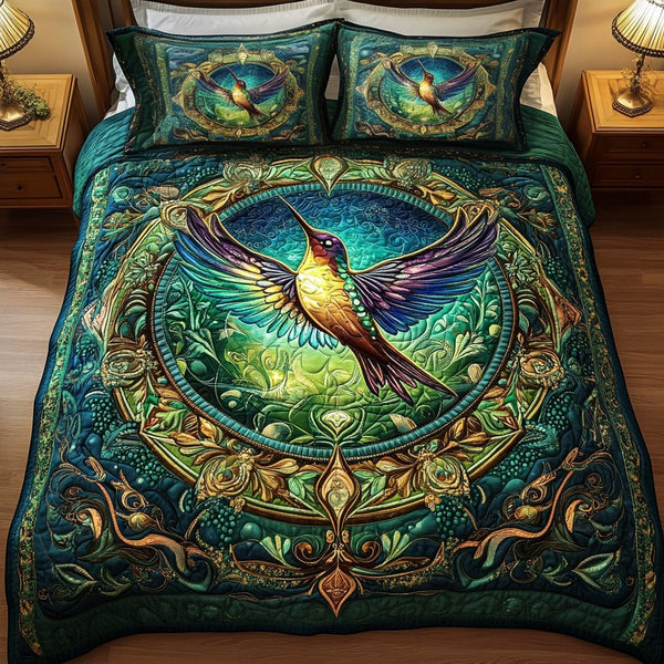 Winged Wonder quilted 3-piece bedding set on a made bed with two matching pillow shams