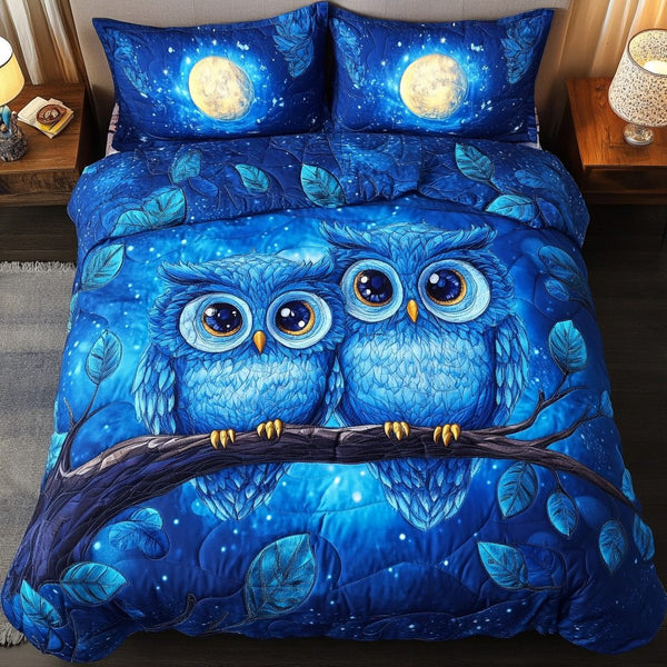 Wings of Affection quilted 3-piece bedding set on a made bed with two matching pillow shams