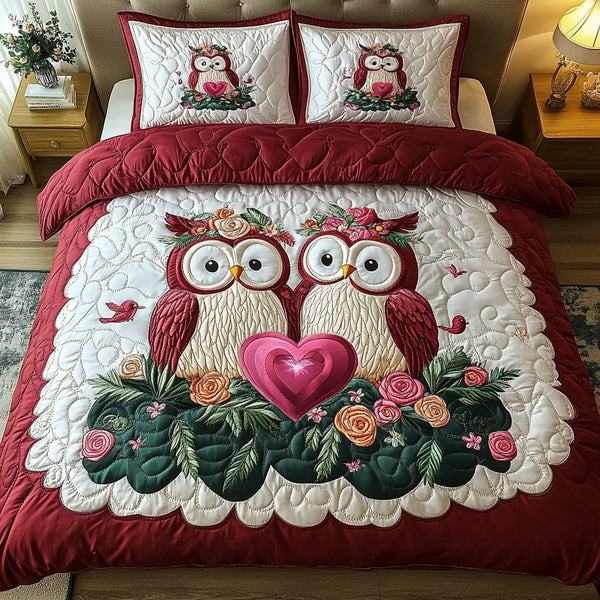 Wings of Affection quilted 3-piece bedding set on a made bed with two matching pillow shams