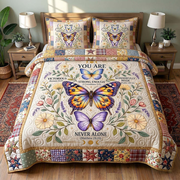 Wings Of Faith quilted 3-piece bedding set on a made bed in a softly lit bedroom