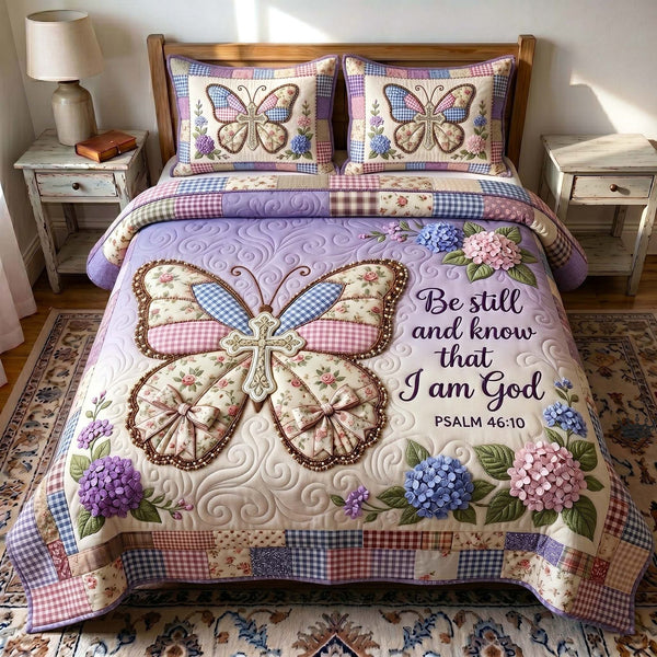 Wings Of Faith quilted 3-piece bedding set on a made bed in a softly lit bedroom
