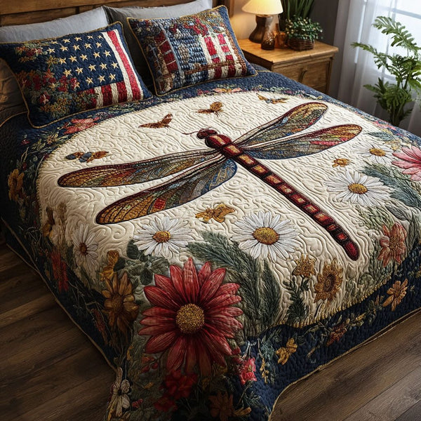 Wings of Freedom quilted 3-piece bedding set on a made bed in a warmly lit bedroom