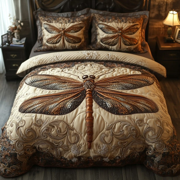 Wings of Serenity quilted 3-piece bedding set on a made bed with two matching pillow shams