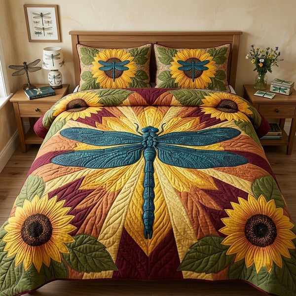 Wingsofthe Garden quilted 3-piece bedding set on a made bed with two matching pillow shams