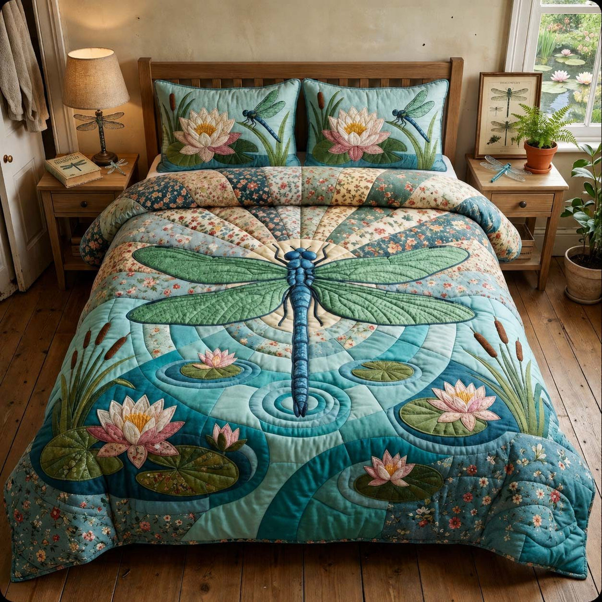 Wingsofthe Garden quilted 3-piece bedding set on a made bed with two matching pillow shams