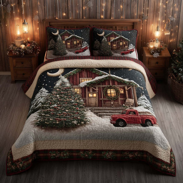 Winter Barn quilted 3-piece bedding set on a made bed in a winter-styled bedroom