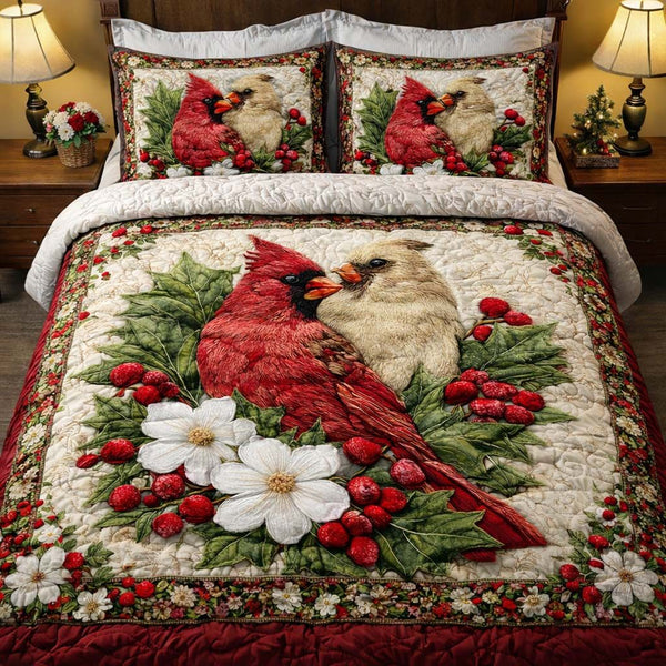 Winterberry Cardinal Pair quilted 3-piece bedding set on a made bed in a winter-styled bedroom
