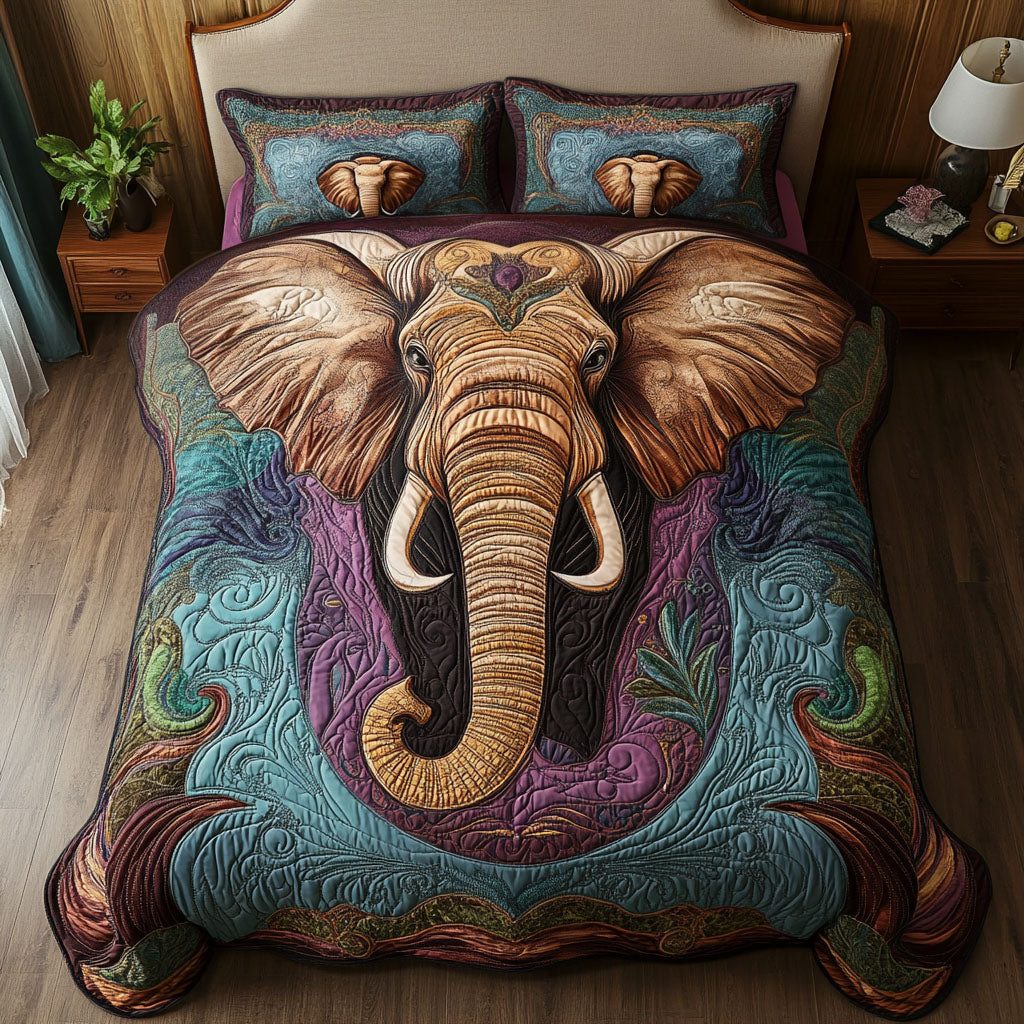 Wisdom of the Elephant quilted 3-piece bedding set on a made bed with two matching pillow shams
