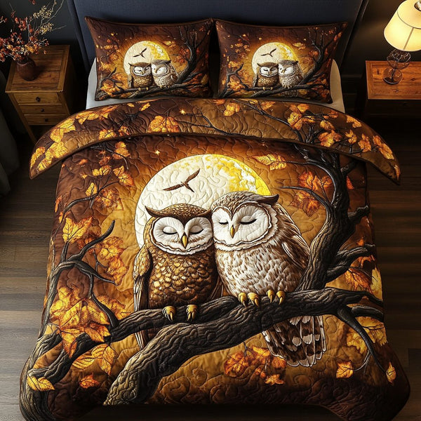 Wise in Love quilted 3-piece bedding set on a made bed with two matching pillow shams