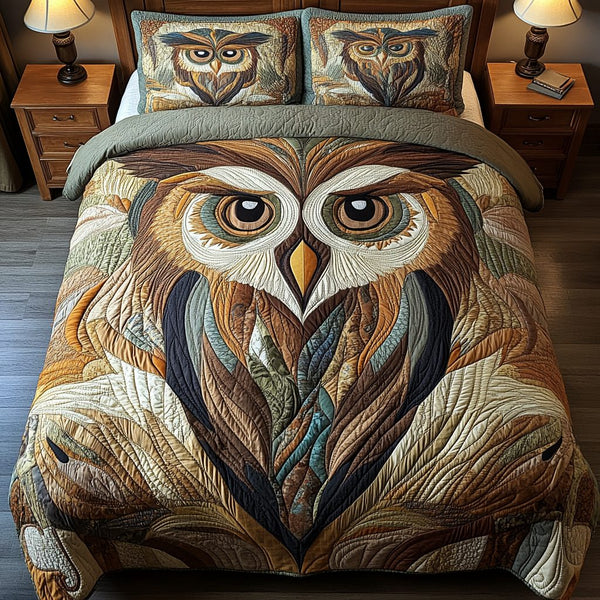 Wise Owl quilted 3-piece bedding set on a made bed with two matching pillow shams