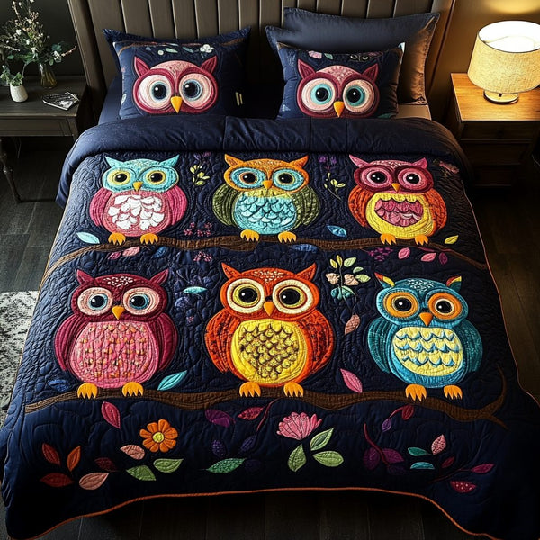 Wise Woods quilted 3-piece bedding set on a made bed with two matching pillow shams