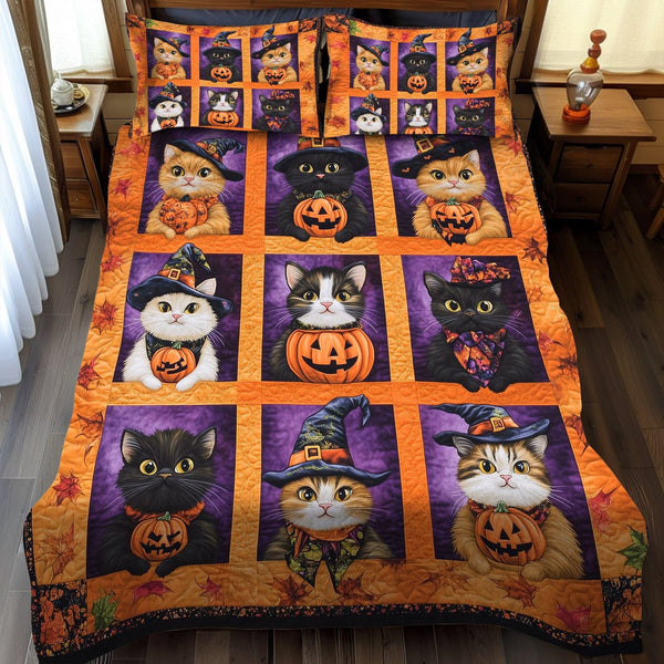 Witch Hat Kitties quilted 3-piece bedding set on a made bed against a dark styled interior