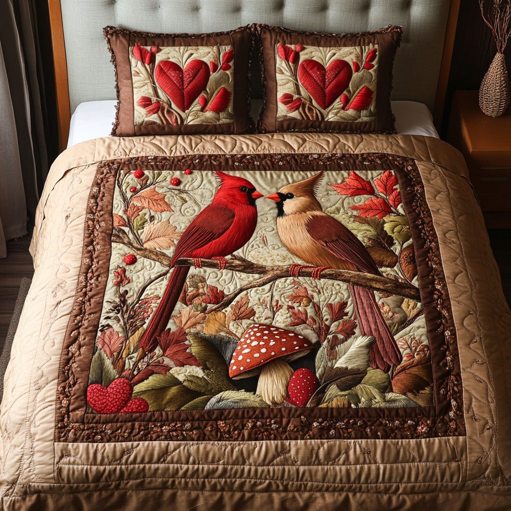 Woodland Cardinal Romance quilted 3-piece bedding set on a made bed with two matching pillow shams