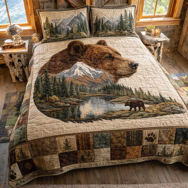 Woodland Lodge quilted 3-piece bedding set on a made bed with two matching pillow shams