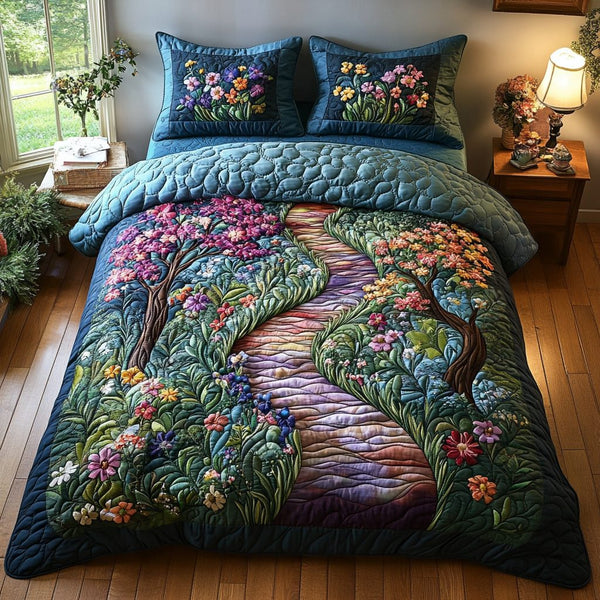 Woodland Pathways quilted 3-piece bedding set on a made bed with two matching pillow shams