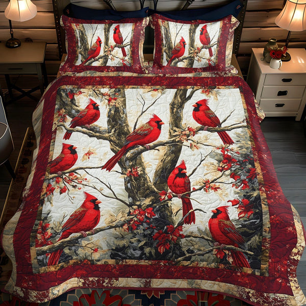 Woodland Redbirds quilted 3-piece bedding set on a made bed with two matching pillow shams