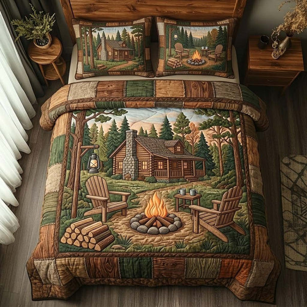 Woodland Retreat quilted 3-piece bedding set on a made bed with two matching pillow shams