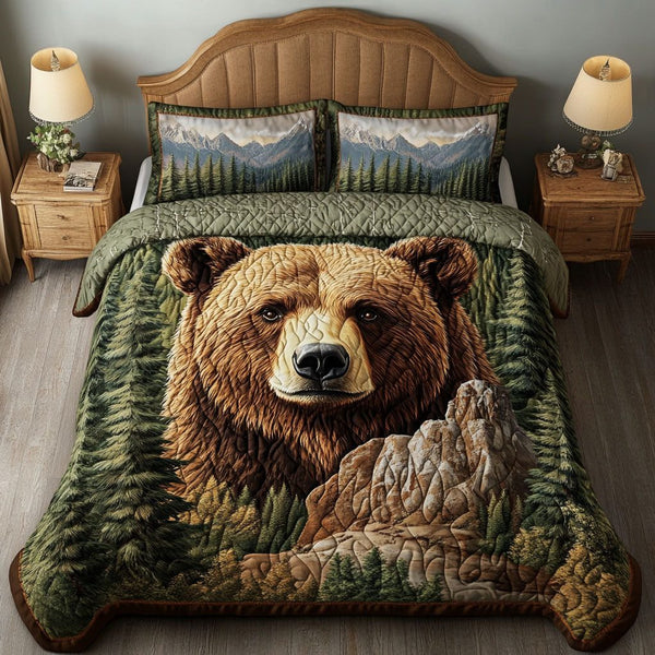 Woodland Retreat quilted 3-piece bedding set on a made bed with two matching pillow shams