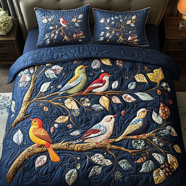 Woodland Serenade quilted 3-piece bedding set on a made bed with two matching pillow shams