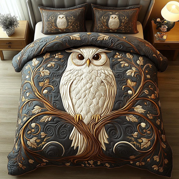 Woodland Wisdom quilted 3-piece bedding set on a made bed with two matching pillow shams