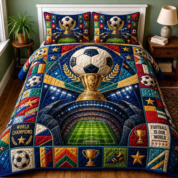 World Champions Soccer Trophy quilted 3-piece bedding set on a made bed with two matching pillow shams