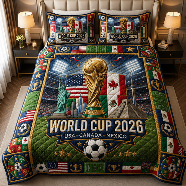World Cup quilted 3-piece bedding set on a made bed with two matching pillow shams