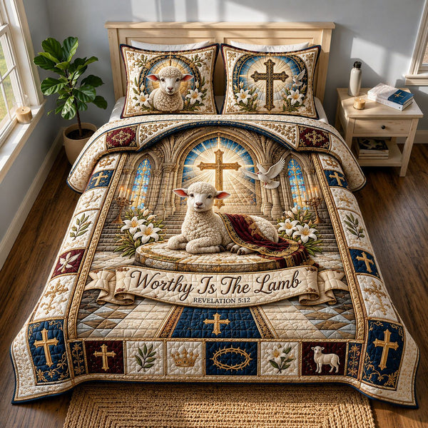 Worthy Lamb quilted 3-piece bedding set on a made bed with two matching pillow shams
