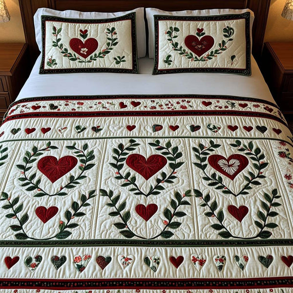 Wreath Charm quilted 3-piece bedding set on a made bed in a winter-styled bedroom