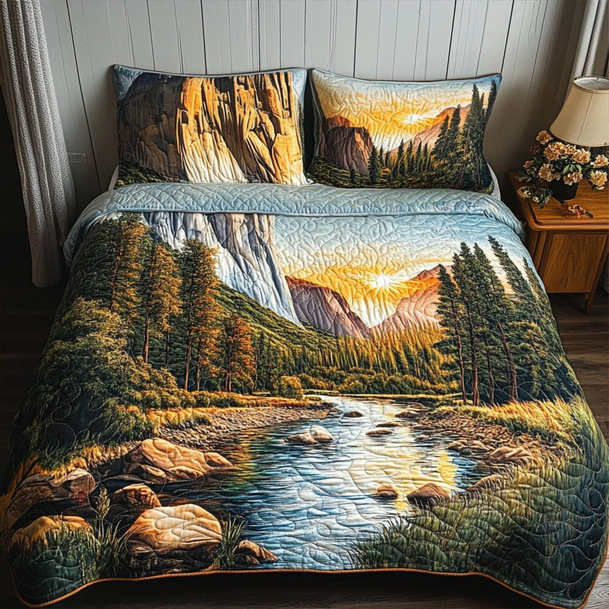 Yosemite Peaks quilted 3-piece bedding set on a made bed with two matching pillow shams