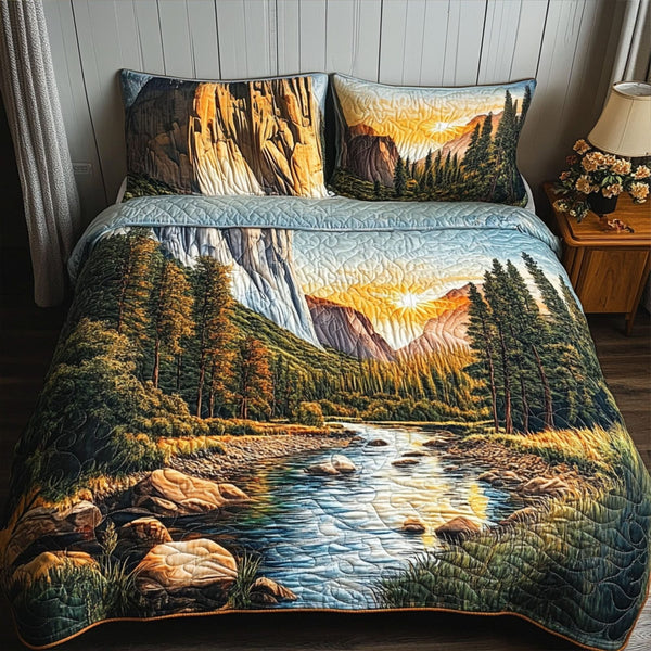 Yosemite Peaks quilted 3-piece bedding set on a made bed with two matching pillow shams