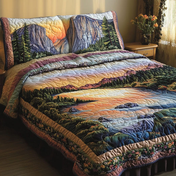 Yosemite Sunset quilted 3-piece bedding set on a made bed with two matching pillow shams