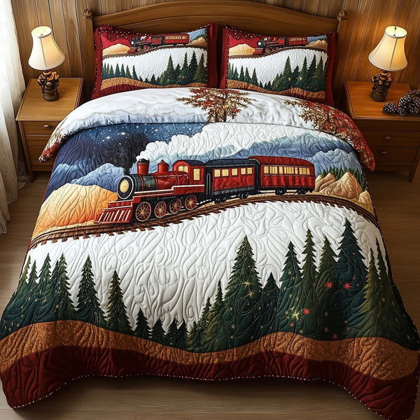 Yuletide Express quilted 3-piece bedding set on a made bed with two matching pillow shams