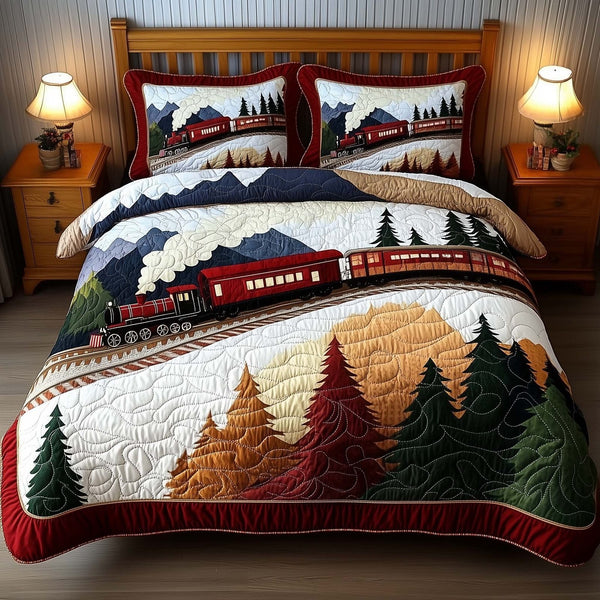 Yuletide Express quilted 3-piece bedding set on a made bed with two matching pillow shams