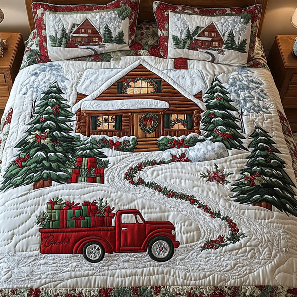Yuletide Path quilted 3-piece bedding set on a made bed with two matching pillow shams